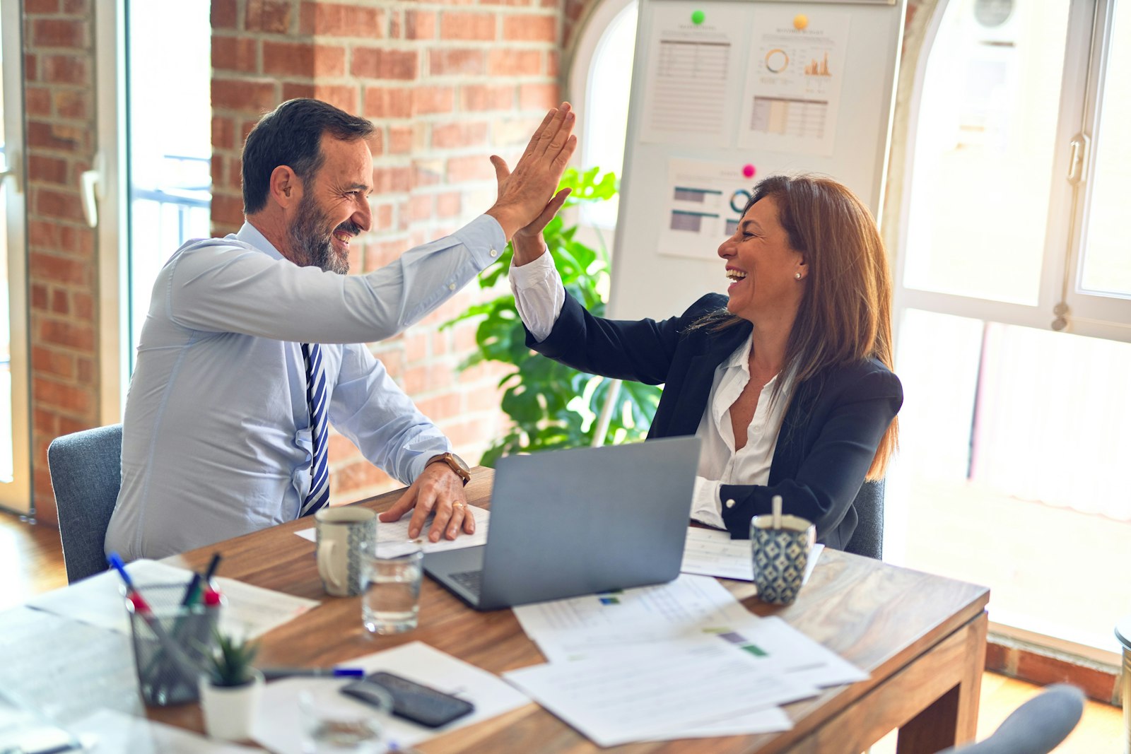 Professionals discussing career progress